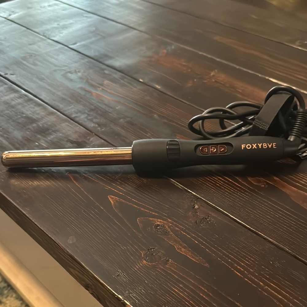 Gold and Black Hair Styling Tool